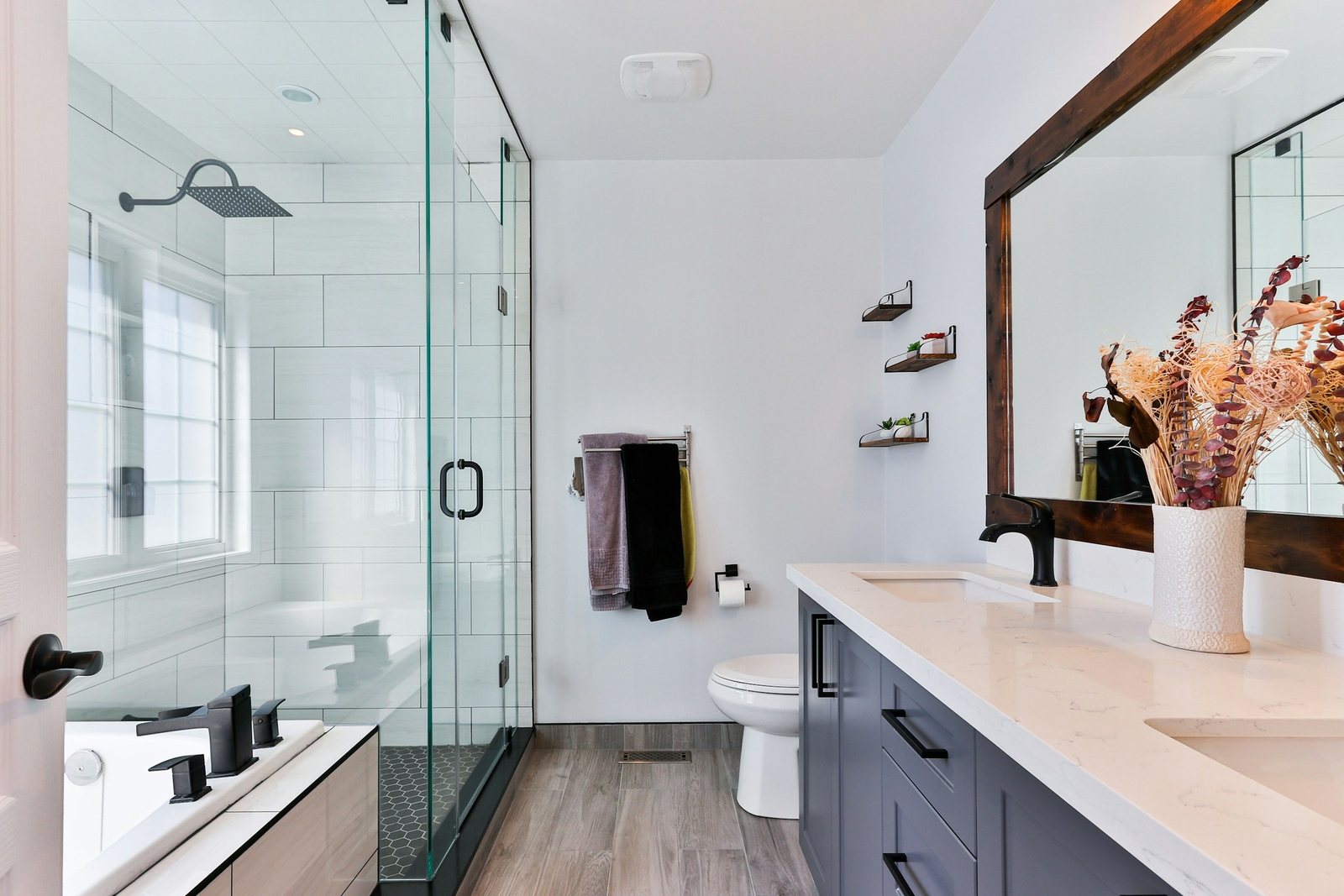 Bathroom with glass shower screen and basin cleaned
