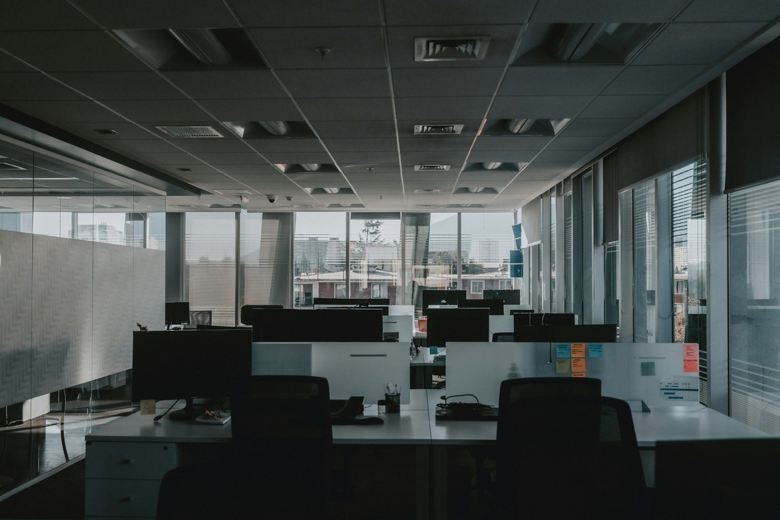 Office floor cleaned across the workstations